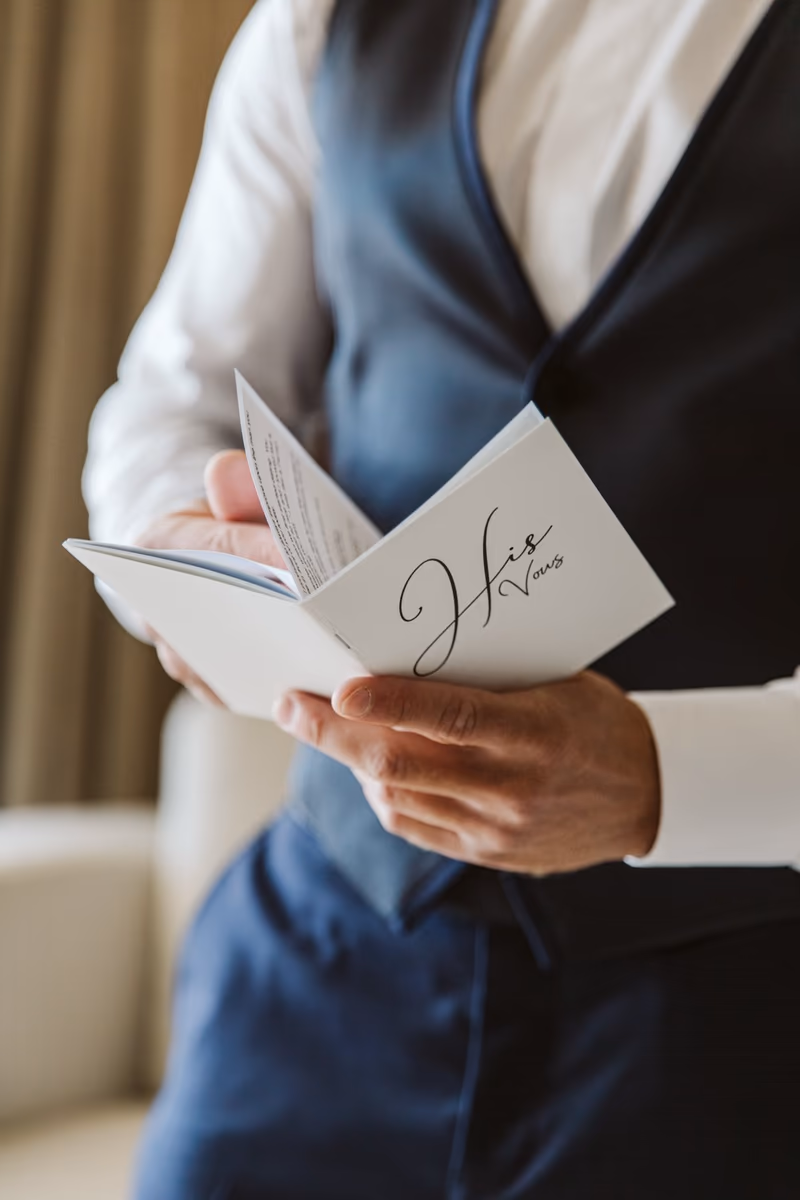 The groom reading his vows before the ceremony at Hyatt Ziva Cancun