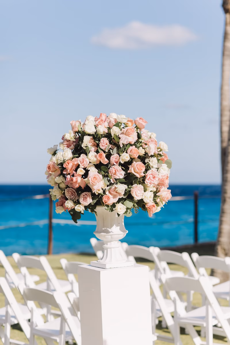 Ceremony flowers facing the Caribbean before the guests arrive at Hyatt Ziva Cancun