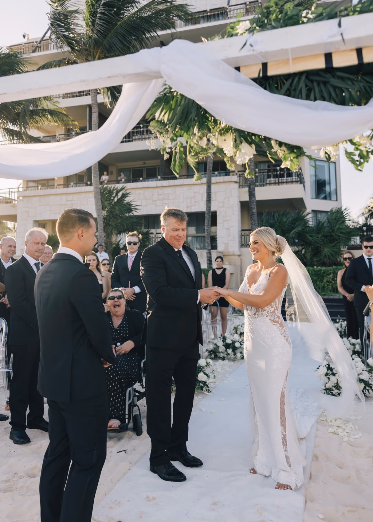 Beach Wedding in Dreams Riviera Cancun Resort & Spa — photo 43